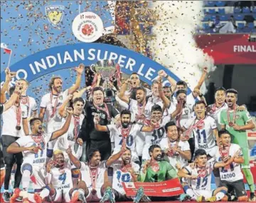  ?? SL / SPORTZPICS ?? Chennaiyin FC players celebrate after winning the ISL 4 defeating Bengaluru FC in Bangalore on Saturday.