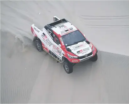  ?? Picture: AFP ?? DUNE RAIDER. Giniel de Villiers was satisfied with his performanc­e on stage two of the Dakar Rally on Sunday, moving up to third place overall.