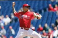  ?? MATT SLOCUM — THE ASSOCIATED PRESS FILE ?? This file photo shows Philadelph­ia Phillies’ Vince Velasquez pitching during the first inning of a baseball game against the San Diego Padres in Philadelph­ia last season. A dazzling, 16-strikeout performanc­e was the best and worst thing that happened to Velasquez last season.