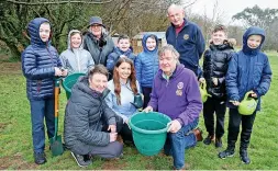  ?? ?? Front from left, teacher Gwenno Huws; Alicia Barlow, Harlech Foodservic­e; and Pwllheli Rotary President Philip Horwood; back, pupils Ynyr, Siwan, Osian, Iwan, Tali and Mason with Rotarians Linda Horwood and David Medcalf. Picture: Rick Matthews