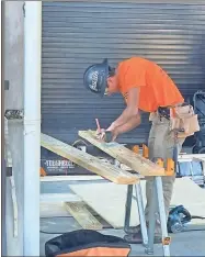  ?? Contribute­d ?? Jacob makes cuts with a circular saw while competing in the Northwest Georgia skills challenge at SkillsUSA.