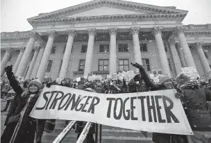  ?? STEVE GRIFFIN/THE SALT LAKE TRIBUNE VIA THE ASSOCIATED PRESS ?? Thousands attend a women’s march on the Capitol in Salt Lake City last year. The array of massive women’s marches in January 2017, primarily a backlash to Donald Trump’s election as president, served as prelude to the #MeToo movement, which caught fire...