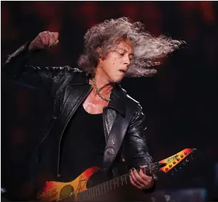  ?? RAY CHAVEZ — STAFF ARCHIVES ?? Metallica lead guitarist Kirk Hammett performs with the San Francisco Symphony in concert during the opening night of the new Chase Center in San Francisco in 2019. The Chase Center is the home of the Golden State Warriors.