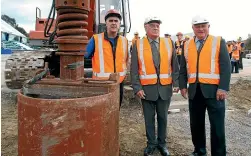  ?? ROBYN EDIE/STUFF ?? Stadium Southland management, from left, Nigel Skelt, Ray Harper, and Acton Smith, on site as the first pile holes are drilled on day one of the rebuild in 2011.