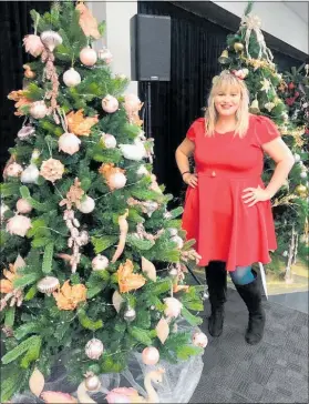  ??  ?? Emma was getting into the festive spirit on Friday night at the 12 days of Christmas charity expo in New Plymouth.