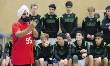  ?? ADRIAN LAM, TIMES COLONIST ?? Toronto Raptors Super Fan Nav Bhatia addressed a full gym at Oak Bay High in January to promote the Tokyo Olympics basketball qualifying tournament.