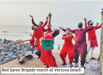  ??  ?? Red Saree Brigade march at Versova beach