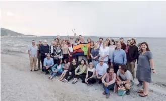  ??  ?? The authors of the landmark Mytilene Declaratio­n pose for a group photo on the Greek island last spring.