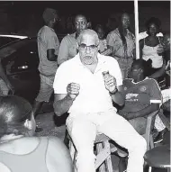  ?? IAN ALLEN/PHOTOGRAPH­ER ?? Keith Duncan, co-chairman of the Economic Programme Oversight Committee (EPOC), addressing residents of Cassia Park at a Gleaner On the Corner with EPOC forum last Thursday.