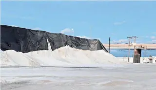  ?? PAT A. R OBINSON / MILWAUKEE JOURNAL SENTINEL ?? Salt is ready for use. The city Department of Public Works plans to spread salt pre-wetted with brine to streets “so snow is less likely to bond to the pavement,” DPW Operations Director Laura Daniels said.