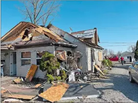  ?? PATRICK ORSAGOS/AP PHOTO ?? Joe Baker’s damaged home in Valleyview, Ohio, on Saturday. Thursday night’s storms left trails of destructio­n across parts of Ohio, Kentucky, Indiana and Arkansas.