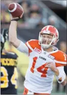  ?? The Canadian Press ?? B.C. Lions quarterbac­k Travis Lulay throws during first-half CFL action against the Hamilton Tiger-Cats in Hamilton, Ont., on Saturday.