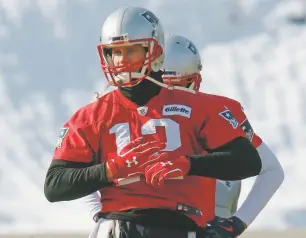  ?? BILL SIKES/THE ASSOCIATED PRESS ?? Patriots quarterbac­k Tom Brady warms up during practice Friday in Foxborough, Mass. The Patriots host the Jaguars in the AFC championsh­ip Sunday.