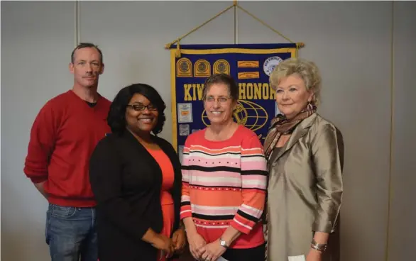  ?? Charlie Benton, SDN) (Photo by ?? The Starkville Kiwanis Club made donations to four community organizati­ons Tuesday, from left to right Dylan Karges of the SEED Garden Program at Sudduth Elementary, Shaniqua Morgan with the Starkville Boys and Girls Club, Susan Tomlinson with Backpack...