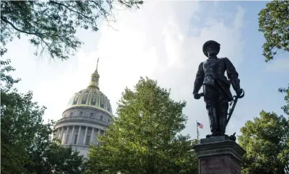  ?? Photograph: Ty Wright/Getty Images ?? A statue of Confederat­e general Stonewall Jackson stands at the West Virginia State Capitol in Charleston, West Virginia.