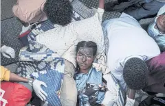  ?? AFP ?? An injured resident of Togoga, about 20km west of Mekelle, arrives on a stretcher to Ayder Referral Hospital in Mekelle.