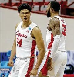  ??  ?? UH’s Quentin Grimes, who finished with a game-high 18 points, reacts in the second half after making one of his four 3-pointers.