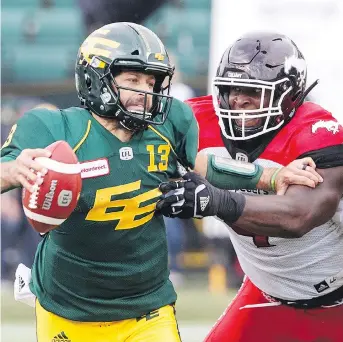  ?? JASON FRANSON/THE CANADIAN PRESS ?? Edmonton Eskimos quarterbac­k Mike Reilly believes the number of head hits he has received has gone down “progressiv­ely” over the years with the CFL penalizing such collisions.