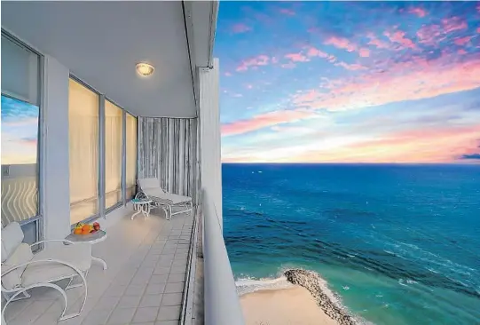  ?? ONE SOTHEBYS INTERNATIO­NAL REALTY ?? A two-bedroom condo at Point of Americas II in Fort Lauderdale features 9-foot ceilings and unobstruct­ed ocean and port views that extend to Miami.