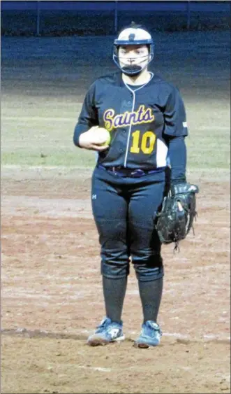  ?? NICK TOPPING — NTOPPING@DIGITALFIR­STMEDIA.COM ?? Saratoga Catholic pitcher Victoria Alvord stares down a batter during the team’s 2-0 over Stillwater April 3, 2017.