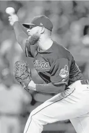  ?? Elsa / Getty Images ?? Indians starter Corey Kluber set the tone with eight strikeouts in the first three innings before finishing with nine in six innings.