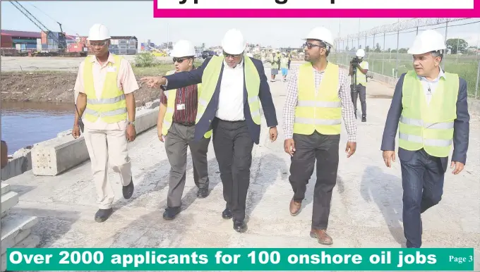  ??  ?? Executives of GSBI giving Minister of Natural Resources, Raphael Trotman (centre) a tour of the facility. Page 3