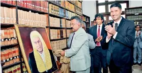  ??  ?? Chief Justice Jayantha Jayasuriya unveiling the portrait of K.N. Choksy