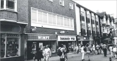  ??  ?? The Fleur de Lis in the High Street as it was in 1955 and, right, how the site looked in 1997, after its transforma­tion