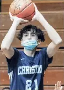  ??  ?? Mekeel Christian Academy guard Joe Roddy made a 3-pointer in each quarter on his way to 12 points in the victory on Saturday.