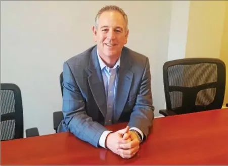  ?? BILL RETTEW JR. — DIGITAL FIRST MEDIA ?? Mark Yoder, President and CEO of the Greater West Chester Chamber of Commerce, takes a break in the board room at the chamber’s new offices.