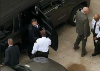  ?? DAVID CARSON — ST. LOUIS POST-DISPATCH VIA AP ?? Missouri Gov. Eric Greitens, top, arrives at court for jury selection in his felony invasion of privacy trial, Thursday in St. Louis. Greitens is accused of taking an unauthoriz­ed and compromisi­ng photo of a woman with whom he had an affair.