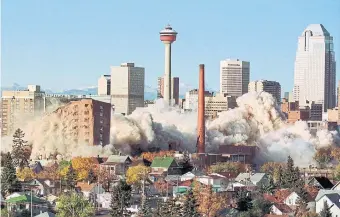  ?? MIKE RIDEWOOD THE CANADIAN PRESS FILE PHOTO ?? Despite being functional, the Calgary General Hospital was imploded in 1998 by the Klein government.