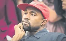  ?? — Washington Post photo ?? Rapper Kanye West, now known as Ye, listens during a meeting with thenPresid­ent Donald Trump at the White House in October 2018.