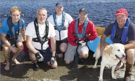  ??  ?? Fionn Crowley, John Hearns, Ronan Whelan, Alan Connolly and Ger Crowley with Joey the dog ahead of the Shannon by Oar challenge.