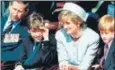  ?? ?? Princes William and Harry with Princess Diana and Prince Charles