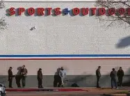  ?? Marie D. De Jesús / Staff photograph­er ?? A line of customers grows outside of Academy Sports + Outdoors, most with the same mission: to buy ammunition. Last year’s sharp increase in gun ownership also has caused a nationwide shortage of bullets.