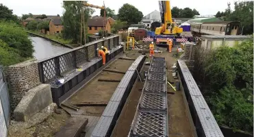  ??  ?? The canal bridge side panels being replaced on July 3.