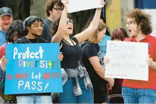  ?? AMY BETH BENNETT/SOUTH FLORIDA SUN SENTINEL ?? Students voice their opposition to Florida House Bill 999 during a protest at the Kenneth R. Williams Administra­tion Building at Florida Atlantic University in Boca Raton on Wednesday.