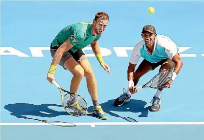  ?? PHOTOS: GETTY IMAGES ?? Michael Venus and his doubles partner Raven Klassen in action during their ASB Classic doubles semifinal in Auckland yesterday.