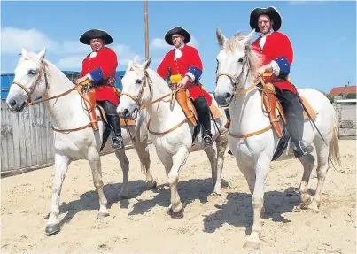  ??  ?? Andy Dewar McCabe, left, with fellow Scots Greys re-enactors.