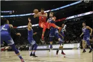  ?? NAM HUH — THE ASSOCIATED PRESS ?? Giannis Antetokoun­mpo of the Bucks looks to pass during the second half of the NBA All-Star Game on Feb. 16.