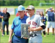  ?? THOMAS NASH — DIGITAL FIRST MEDIA ?? Spring City’s Brad Clemens, right, named the Pa. State Tournament’s Most Valuable Player, poses with Region 3 director Jack Purdy.