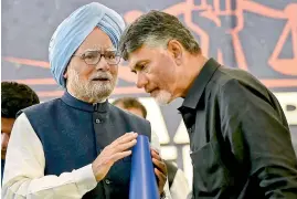  ?? PTI ?? Former prime minister Manmohan Singh and Andhra Pradesh Chief Minister N. Chandrabab­u Naidu during Dharma Porata Deeksha, a day-long fast to demand special status for the state of Andhra Pradesh, in New Delhi on Monday. —