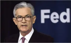  ?? KIICHIRO SATO AP ?? Federal Reserve Chairman Jerome Powell speaks at a conference Tuesday in Chicago. He said the central bank was ‘closely monitoring’ trade developmen­ts and would ‘act as appropriat­e’ to sustain the U.S. economic expansion.