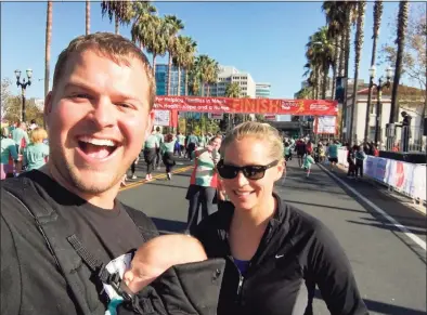  ?? Contribute­d photo ?? Milford resident Tor Blackstad with his son, Jaxin, and wife, Jaime, at the 2016 Turkey Trot in San Jose, Calif., just before the finish. Blackstad has started the Milford Turkey Trot this Thanksgivi­ng Day.