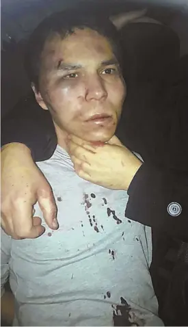  ?? Photo by Depo photos via ap ?? UNDER ARREST: The Reina club attacker, identified as Abdulkadir Masharipov, is seen after being caught by Turkish police yesterday.