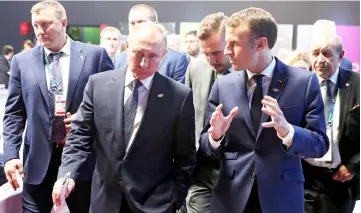  ??  ?? Putin (left) speaks with his French counterpar­t Emmanuel Macron during a meeting on the sidelines of the G20 summit in Buenos Aires, Argentina. — Reuters photo