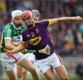  ??  ?? Paul Morris taking on Offaly defender Paddy Delaney.