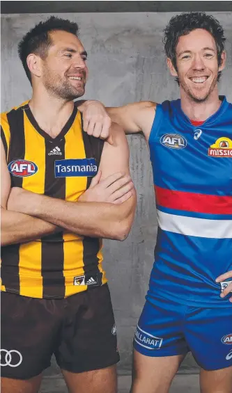  ?? Picture: MICHAEL KLEIN ?? Hawthorn’s Luke Hodge and Western Bulldog Robert Murphy face off before what could be their final AFL matches tonight.