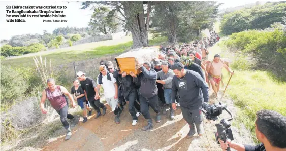  ?? Photo / Sarah Ivey ?? Sir Hek’s casket was carried up to Te Rangihauka­ha Urupa¯ where he was laid to rest beside his late wife Hilda.